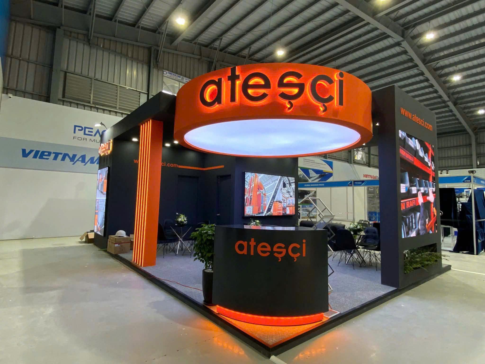 Atesci (Türkiye) — island stand with illuminated cylinder